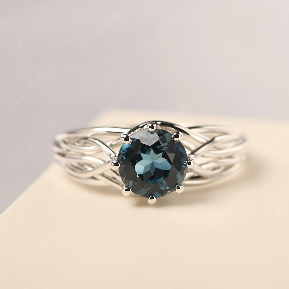 Topgemco Crossover London Blue Topaz Ring – Round Cut Abstract Sterling Silver December Birthstone Ring