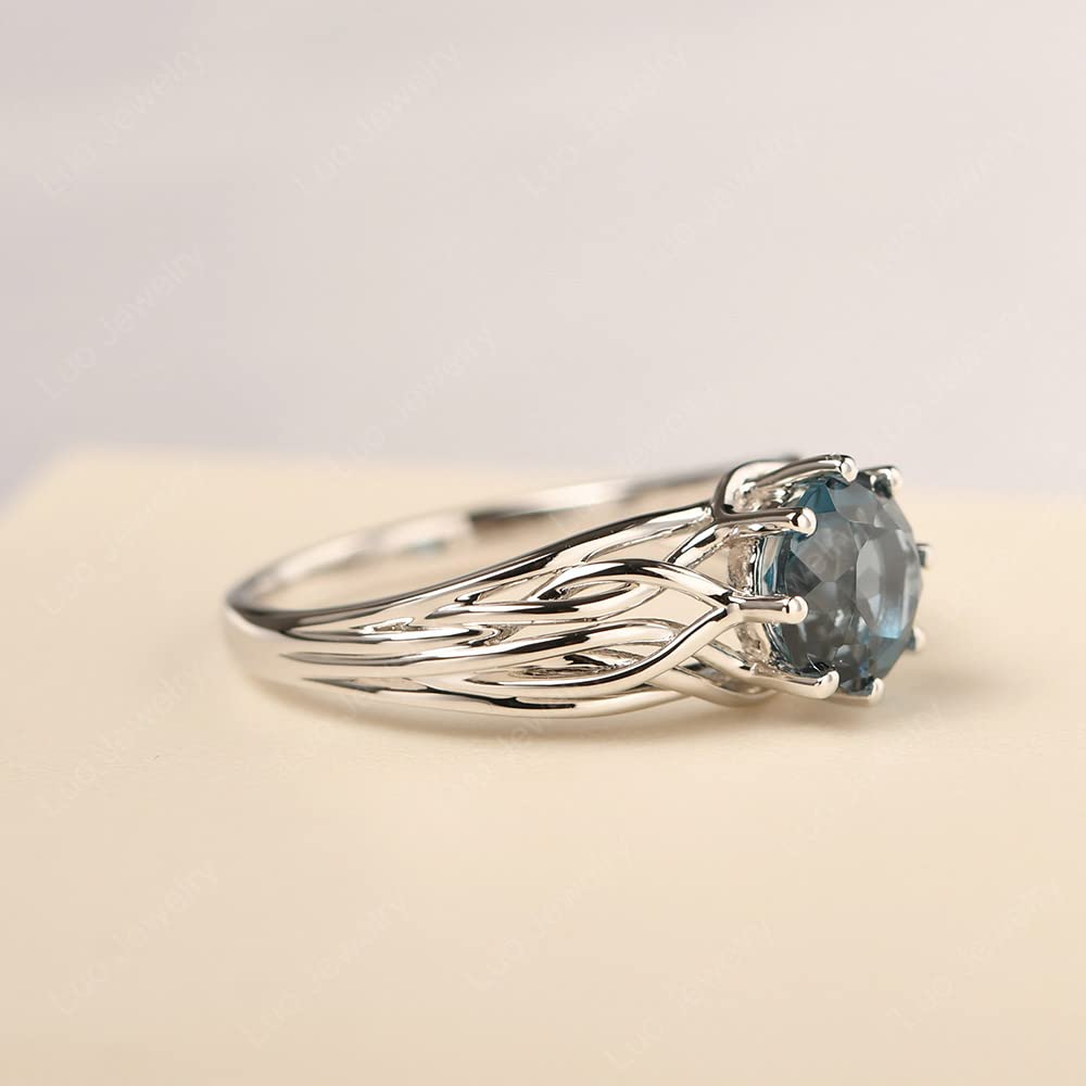 Topgemco Crossover London Blue Topaz Ring – Round Cut Abstract Sterling Silver December Birthstone Ring