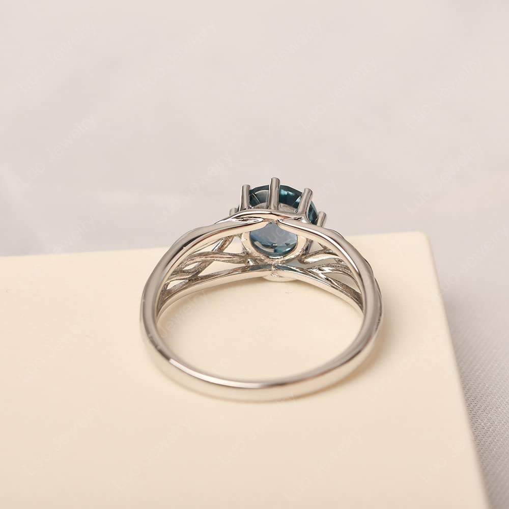 Topgemco Crossover London Blue Topaz Ring – Round Cut Abstract Sterling Silver December Birthstone Ring