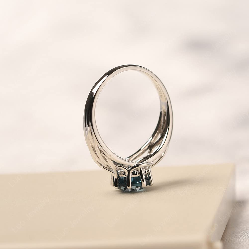 Topgemco Crossover London Blue Topaz Ring – Round Cut Abstract Sterling Silver December Birthstone Ring