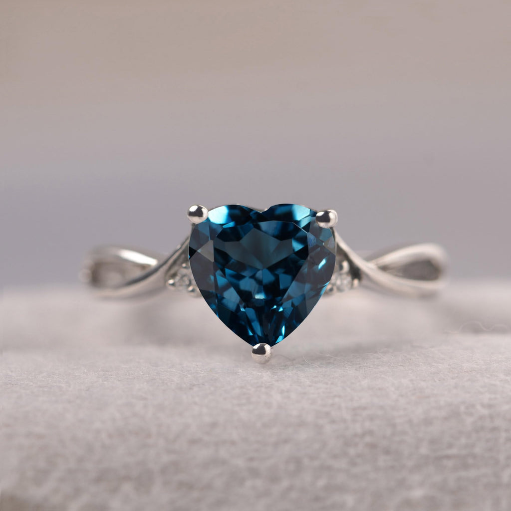 Topgemco Heart-Shaped London Blue Topaz Ring – Twisted Split Shank Sterling Silver December Birthstone Ring