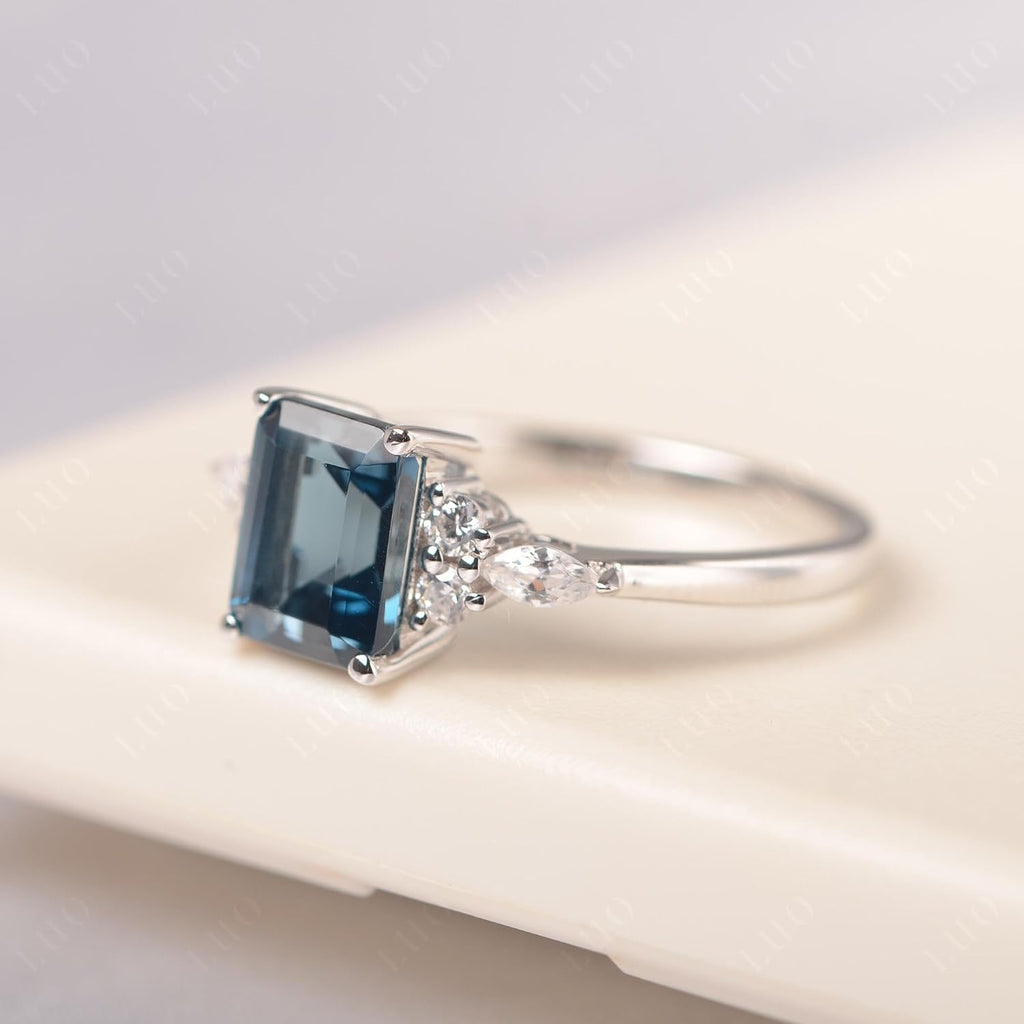 Topgemco Emerald-Cut London Blue Topaz Engagement Ring – Halo Sterling Silver December Birthstone Ring