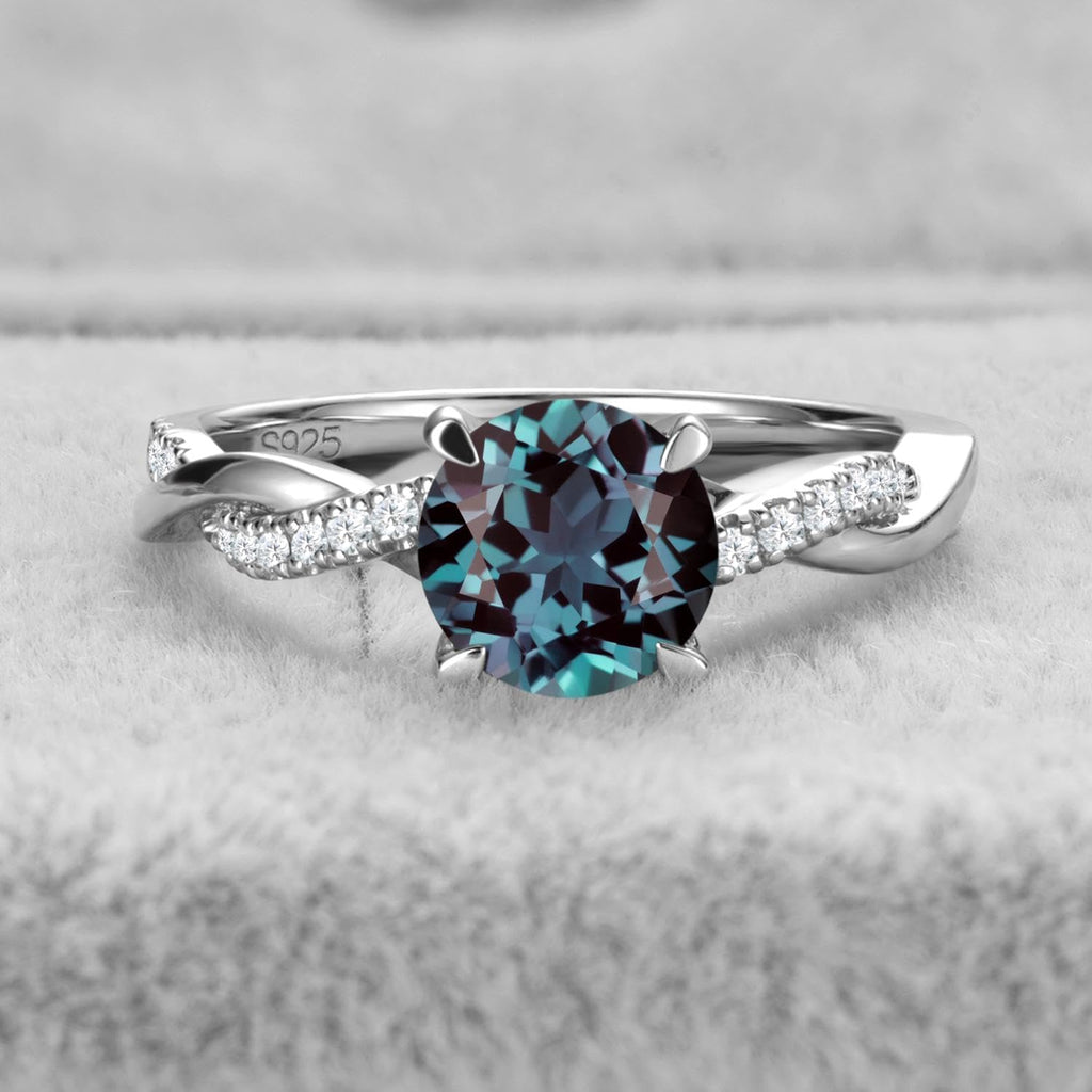 Topgemco Twisted Infinity Ring – Round-Cut Alexandrite in 925 Sterling Silver, Sizes 3–13