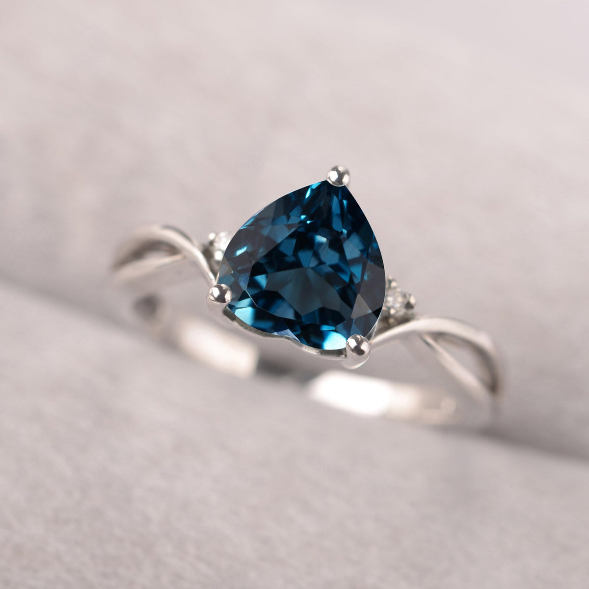Topgemco Heart-Shaped London Blue Topaz Ring – Twisted Split Shank Sterling Silver December Birthstone Ring