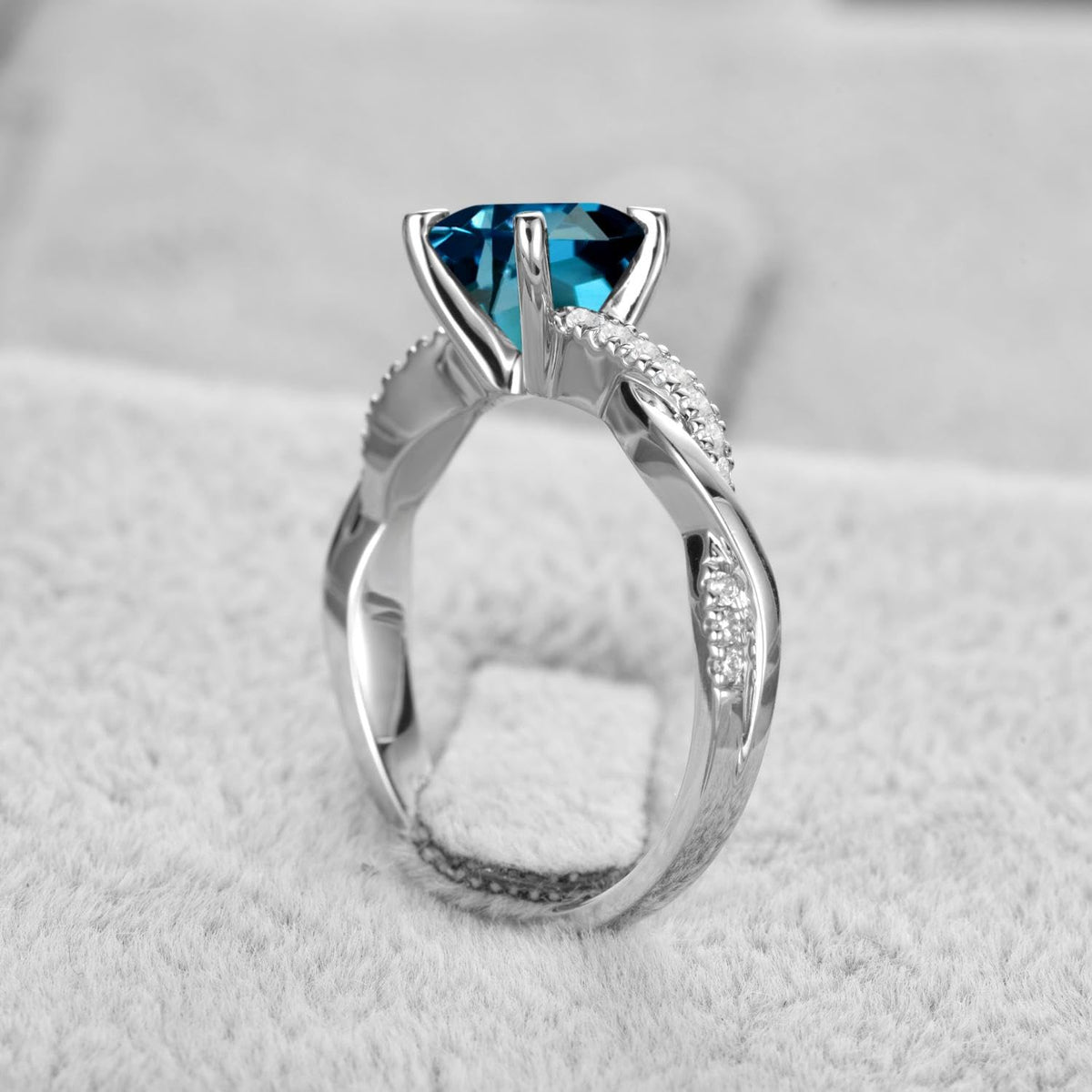 Topgemco Twisted London Blue Topaz Ring – Round Cut Sterling Silver December Birthstone Ring