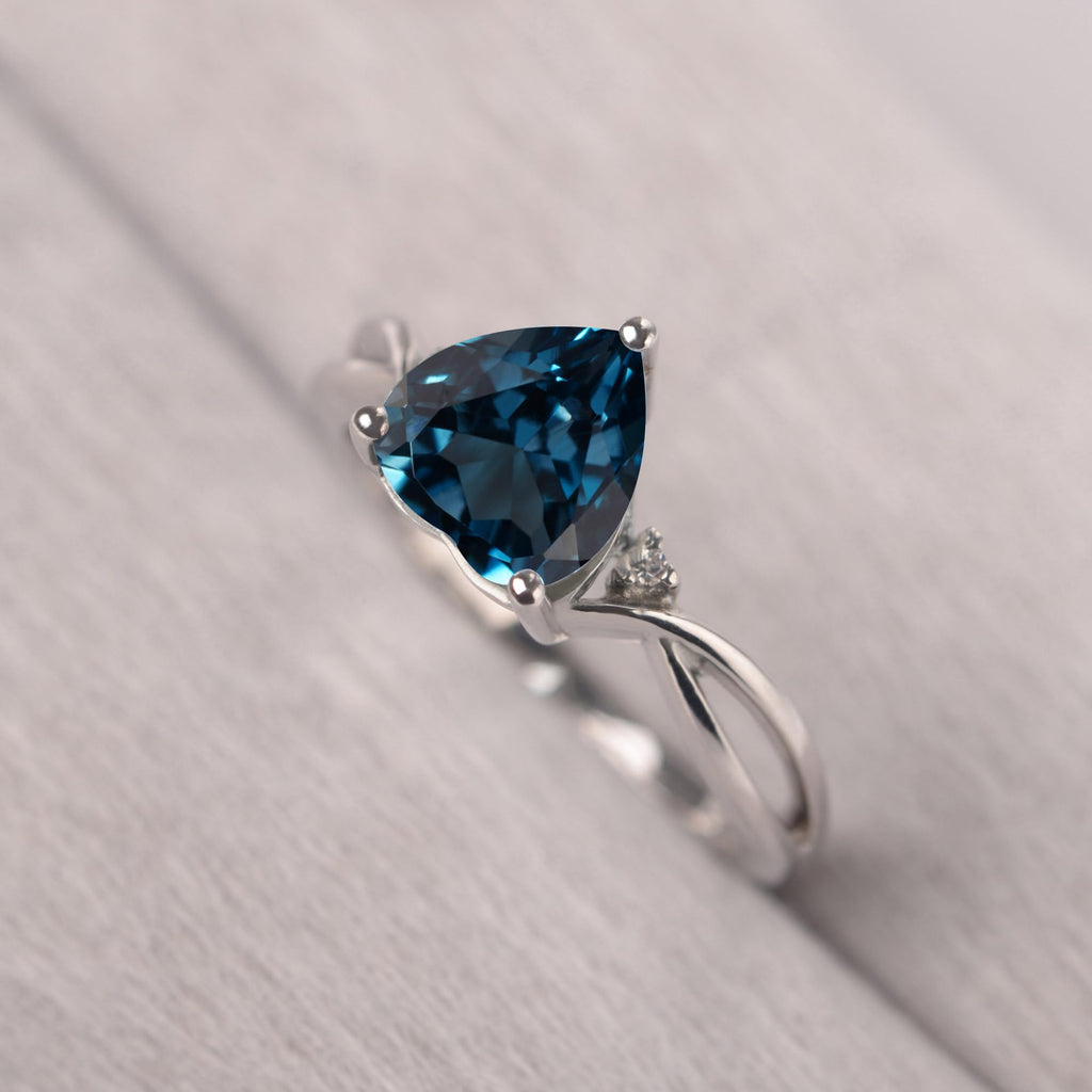 Topgemco Heart-Shaped London Blue Topaz Ring – Twisted Split Shank Sterling Silver December Birthstone Ring