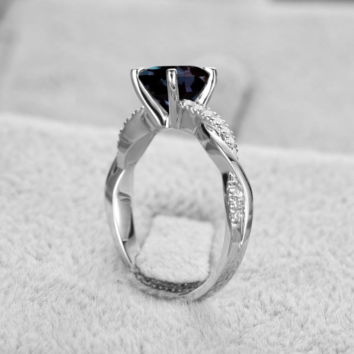 Topgemco Twisted Infinity Ring – Round-Cut Alexandrite in 925 Sterling Silver, Sizes 3–13