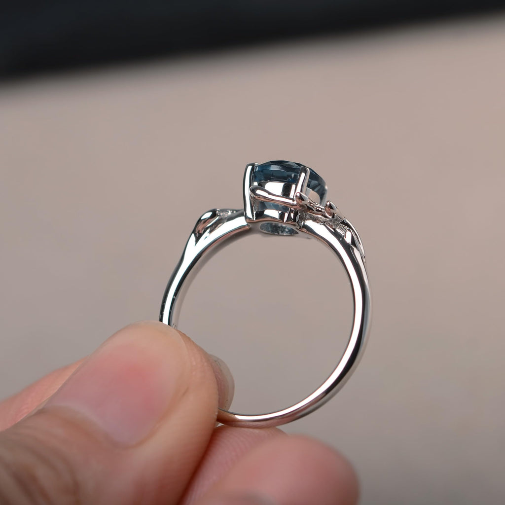 Topgemco London Blue Topaz Leaf Bypass Ring – Round Cut Sterling Silver December Birthstone Ring for Women