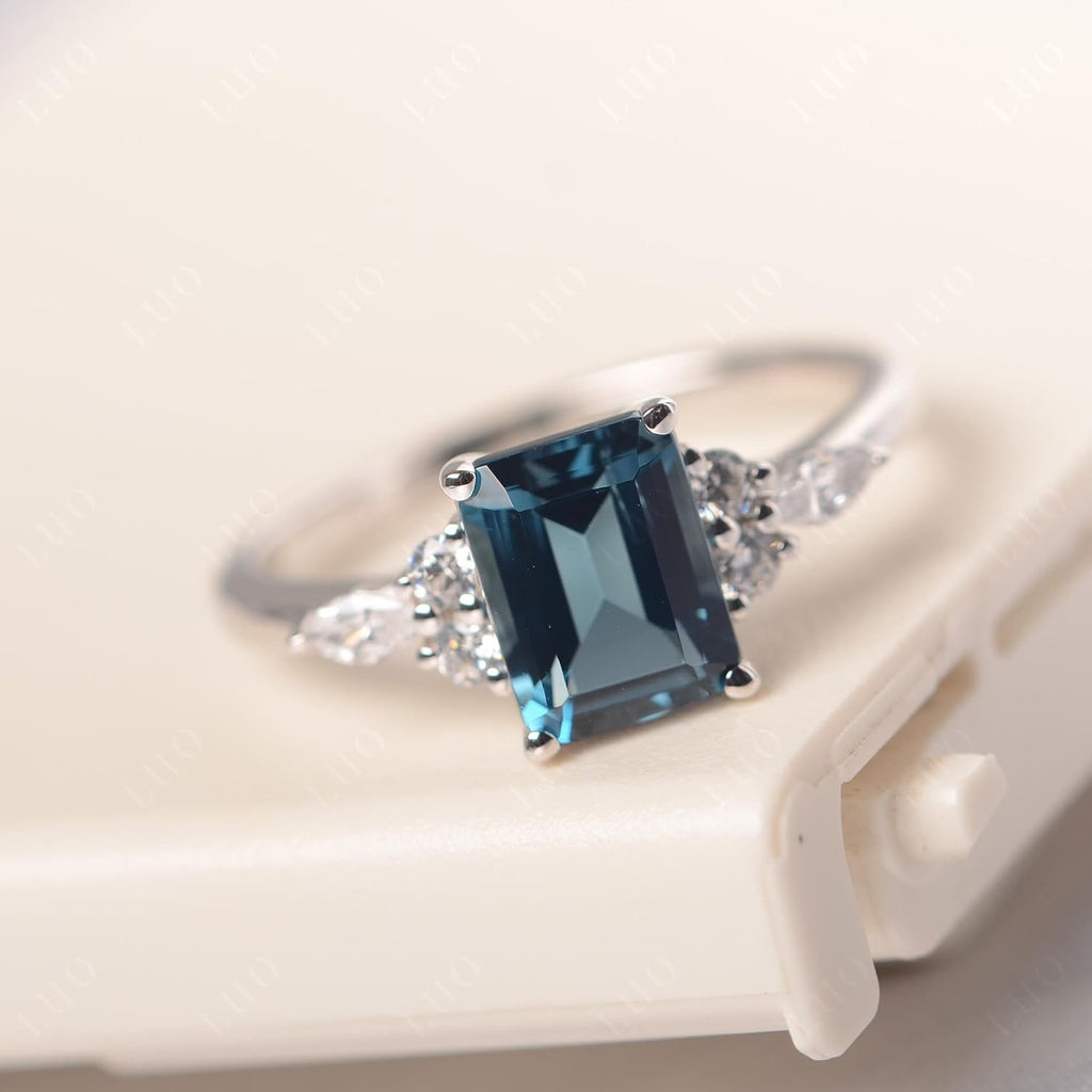 Topgemco Emerald-Cut London Blue Topaz Engagement Ring – Halo Sterling Silver December Birthstone Ring