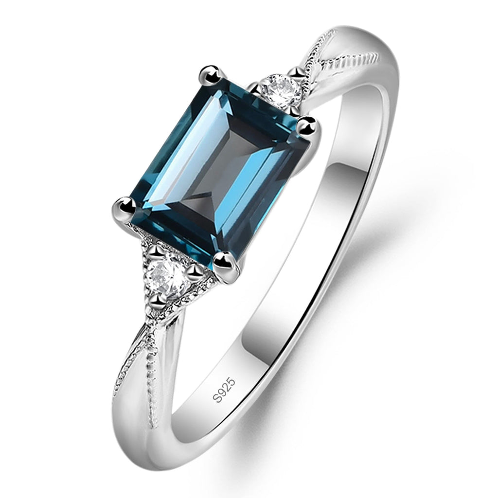 Topgemco East-West London Blue Topaz Ring – Emerald Cut Sterling Silver December Birthstone Ring