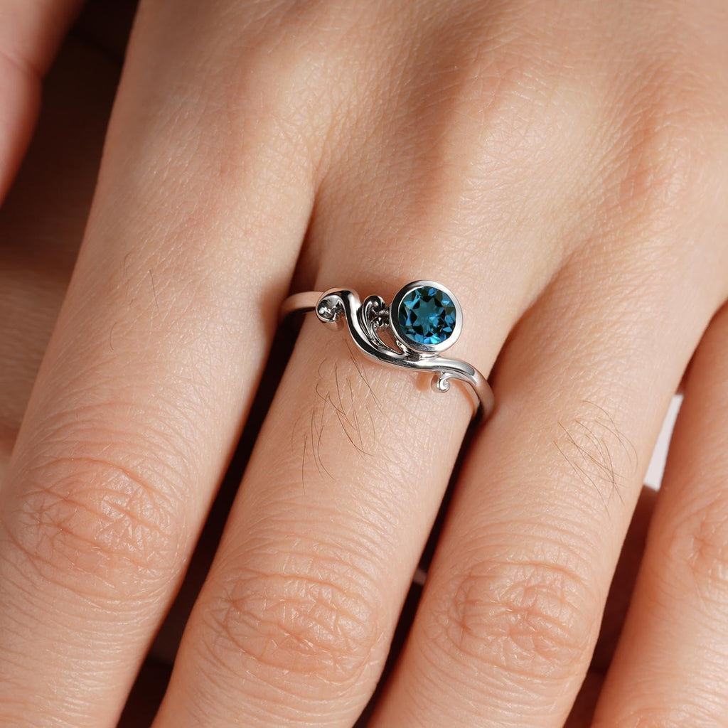Topgemco Ocean Wave London Blue Topaz Ring – Bezel Set Round Sterling Silver December Birthstone Ring