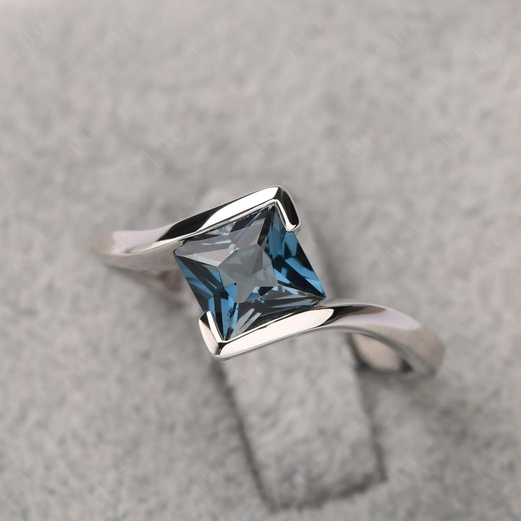 Topgemco Princess-Cut London Blue Topaz Tension Ring – Bezel Set Sterling Silver December Birthstone Ring
