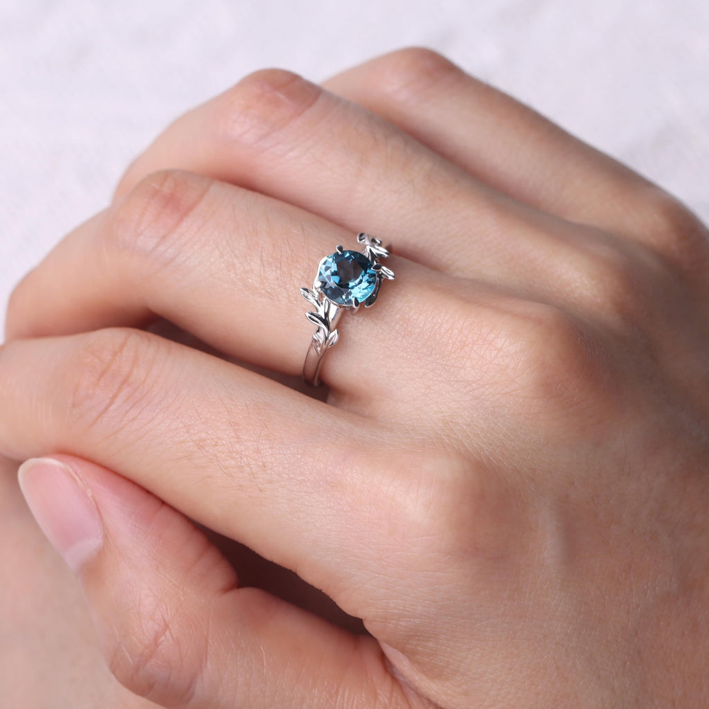 Topgemco London Blue Topaz Leaf Bypass Ring – Round Cut Sterling Silver December Birthstone Ring for Women